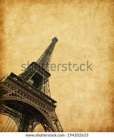 Eiffel Tower , Paris,  France. Photo in retro style. Added  paper texture.
