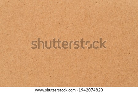 Brown paper surface and background.