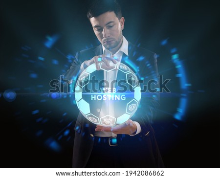 Business, Technology, Internet and network concept. Young businessman working on a virtual screen of the future and sees the inscription: Web hosting