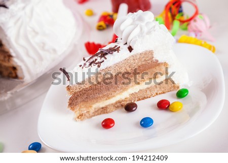 Slice Of Birthday Cake With Birthday Decoration