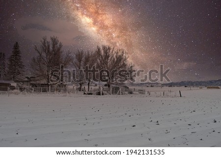 The Milky Way over the snowy fields