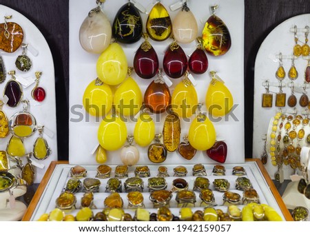 Image of amber rings, bracelets, earrings and pendants for sale. .