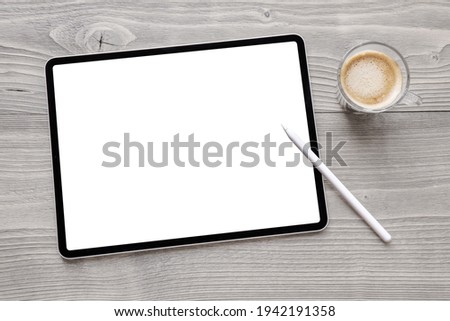 Digital tablet mockup with blank white screen and wireless stylus pen