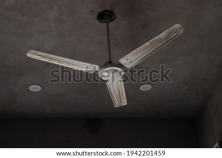 White fan and dust on the fan 