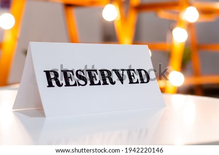 Reserved Sign On A Table In Restaurant