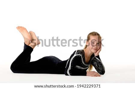 Young teen girl gymnastic on white background 