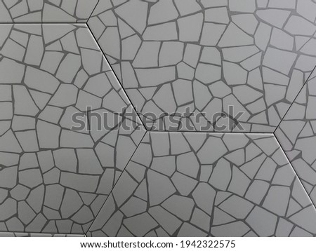 the texture of the floor tiles. Background of small stones