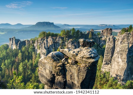 View to the Bastei Bridge and Rock Formations in the Elbe River Valley, Saxon Switzerland National Park, Germany Royalty-Free Stock Photo #1942341112
