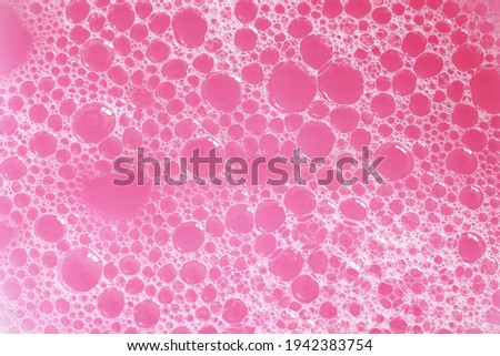 bright pink liquid with foam