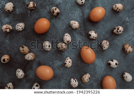 Food composition with eggs on dark background. Flat lay, Top view