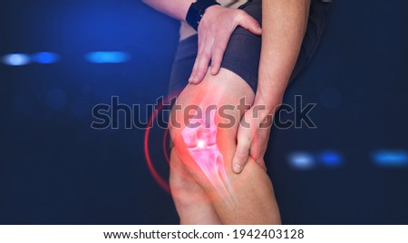 Medical banner. Digital bone on the human foot. Man suffering from knee pain. Injury caused by training. Tendon problems.  Royalty-Free Stock Photo #1942403128