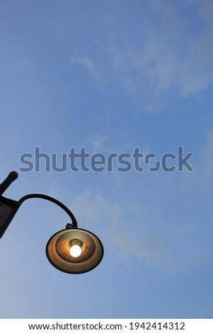 Street lamp with blue sky as background. with space for text or image