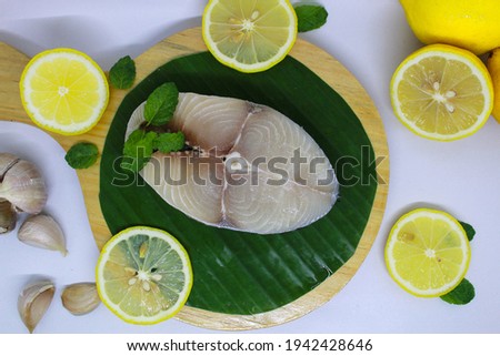 Fresh raw mackerel fish fillet with white background. Seafood, top view, flat lay, food photography