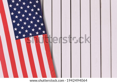 Happy President's day concept with the flag of the United States in the background.