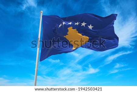 Large Kosovo flag waving in the wind