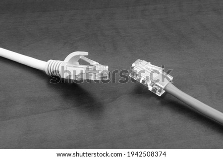 Computer cables on wooden background. Connection, internet and computer network concept.