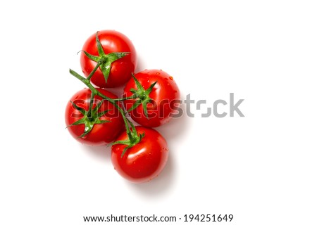Top view of bunch of fresh tomatoes isolated on white background  Royalty-Free Stock Photo #194251649