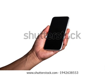 A man's hand holds a mobile phone with his left hand, a black screen. White Background