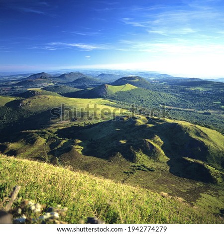 A mesmerizing view of the volcanoes of Auvergne seen from the summit of Puy de Dome Royalty-Free Stock Photo #1942774279
