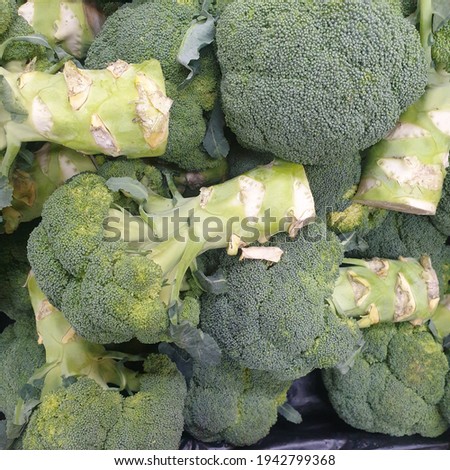 A picture of fresh, green broccolis, closed up broccoli