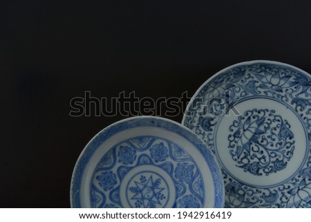 picture plate. 
This is a very fine example of Japanese traditional antique “ imari ware ”. 

black background soft focus image.