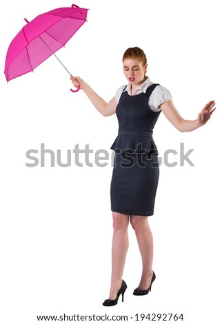Pretty redhead businesswoman holding umbrella on white background