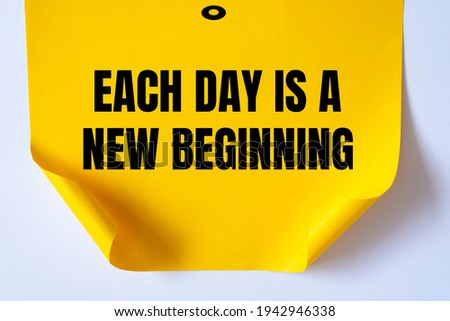 Text Each Day Is A New Beginning.