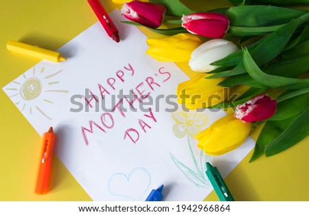 "Happy mother's day" greeting card for Mom drawn by kid on Mother's Day with colorful tulips in bouquet of flowers and crayon markers on yellow background. Congratulations and surprise for Mom.