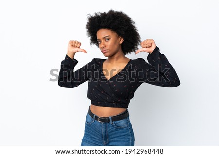 Young African American woman isolated on white background proud and self-satisfied
