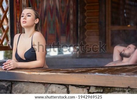 young couple sitting in vats