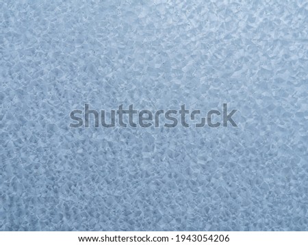 Galvanized metal surface with a geometric texture