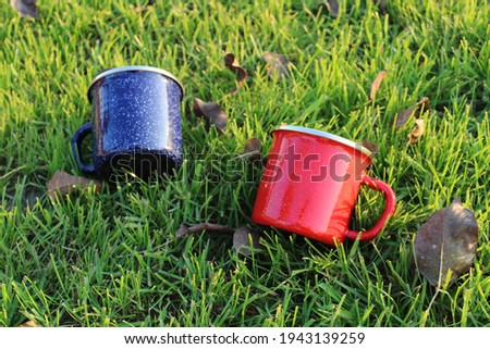 Enamel Camping Cups on the Lawn