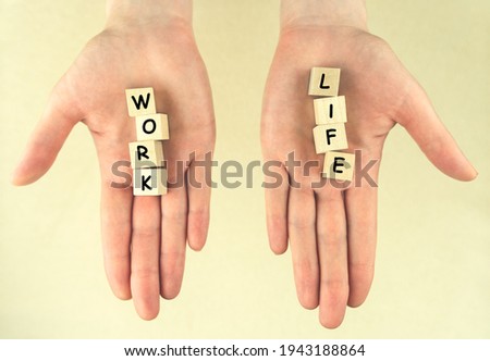 Work and life. Female hands with cubes on light background. Concept of balance, harmony, no stress, imbalance. Choice Royalty-Free Stock Photo #1943188864