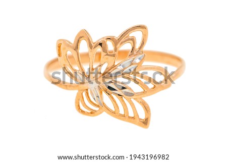 Gold ring. Jewelry close-up isolated on white background. Bijouterie
