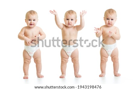 Three poses of standing baby isolated on white background. Emotional toddler weared diaper Royalty-Free Stock Photo #1943198476