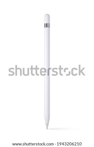 white tablet stylus new model isolated with clipping path on white background. a pencil for touch screen.  Royalty-Free Stock Photo #1943206210