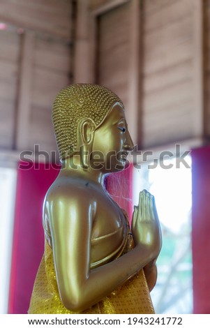 Buddha statue in a temple in Thailand  Can be taken as a background, taken from a side angle.