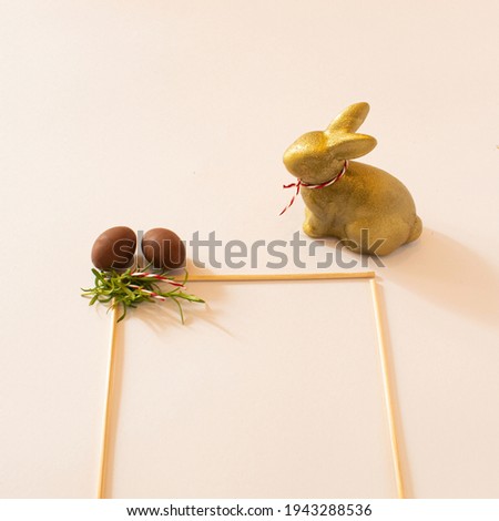 Easter bunny and eggs on pastel background