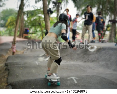 blured​ people​ is playing surf​skate or skateboard at Bangkok, Thailand​