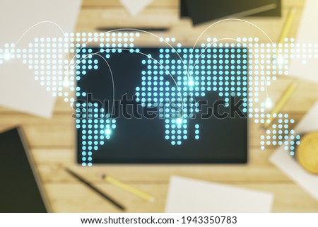 Abstract creative world map with connections and modern digital tablet on background, top view, international trading concept. Multiexposure