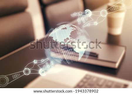 Creative concept of robotics technology with globe sketch on modern laptop background. Robot development and automation concept. Multiexposure