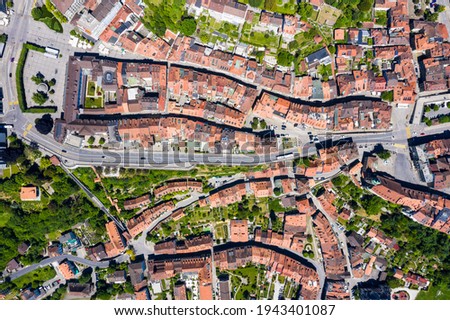 Top down view of Fribourg old town with various landmark such as the town hall and the funicular in Switzerland Royalty-Free Stock Photo #1943401087