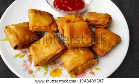 A Beautiful Picture of Chinese Pocket Samosa with Chili sauce. Spicy iftaari dish
