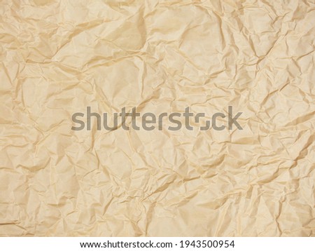 Crumpled brown paper Texture of brown paper that is rough and wrinkled image as background to fill with text or logo in vintage or retro style