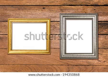 Gold frame on old wooden background