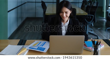 Video conference, Online meeting video call, Portrait of business woman looking at laptop computer screen working or watching webinar on laptop in workplace