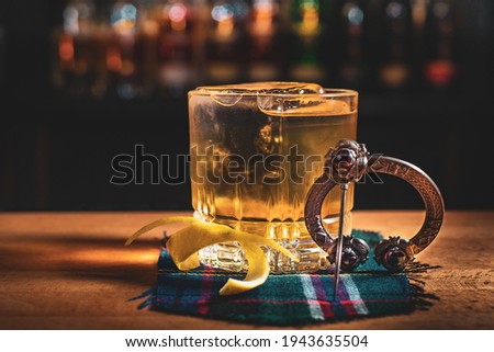 Mixdrink in rustically bar from whisky