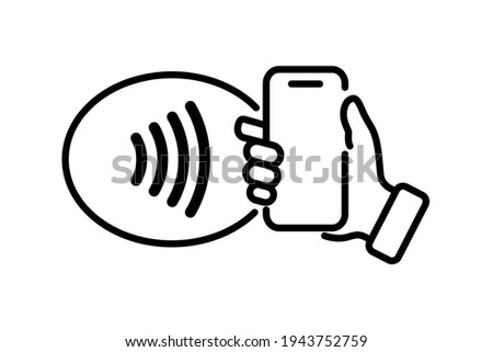 NFC technology. Hand holding Phone. Contactless wireless pay sign logo. Near Field Communication nfc payment concept. Contact less. NFC payment with mobile phone. Credit card Royalty-Free Stock Photo #1943752759
