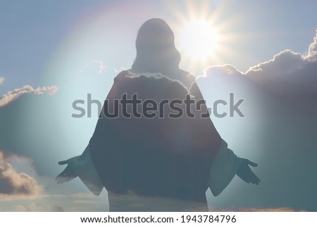 Silhouette of Jesus Christ and cloudy sky, double exposure Royalty-Free Stock Photo #1943784796