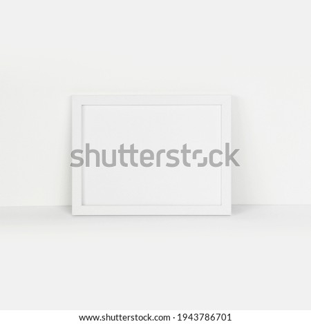 White photo frame on white background